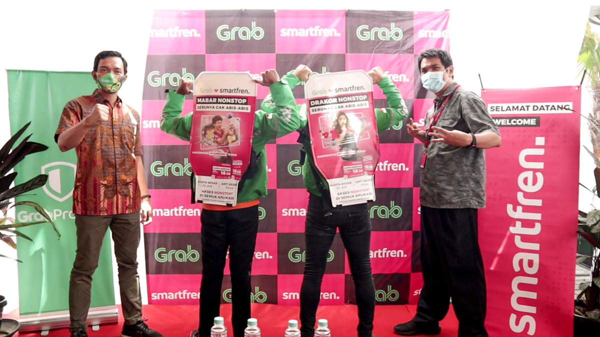 Smartfren Bagikan 700 Partisi GrabProtect untuk GrabBike di Jawa Tengah